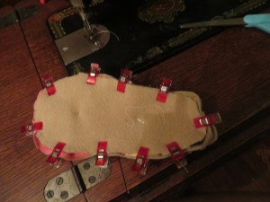 Upper slipper portion and lower sole portion pinned together.