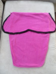 Finished Anna cape unbuttoned and laying flat.