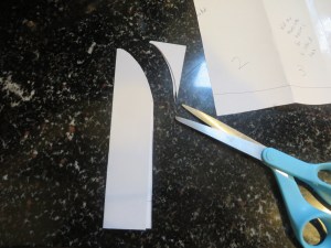 Cut-out panel folded in half and shaped and cut.