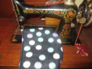 Top-stitched reversible hood.