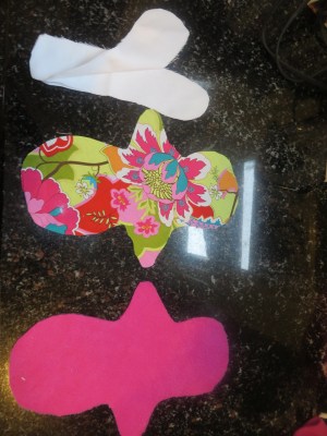 One piece of pattern cut in fleece and one piece cut in cotton.