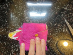3.  Fold in right flap.